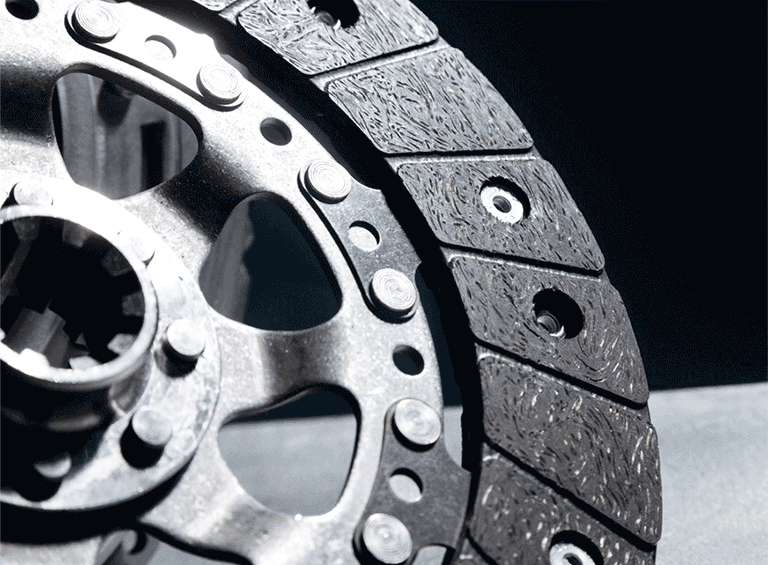 Close-up of a car clutch assembly, an essential component of the vehicle's transmission system, demonstrating mechanical functionality